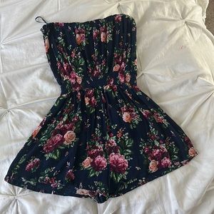 Cute romper to wear when it’s warm outside!! Floral designs and a bandeau top.